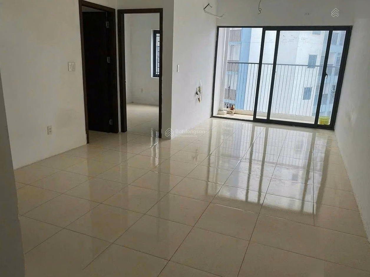 The owner needs to sell a 2-bedroom apartment in A PH Nha Trang building, 62.7m², Northeast balcony, price 1.85 billion