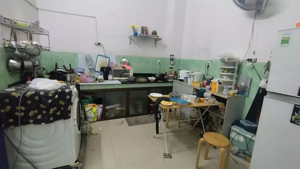 next to himlam area district 7 - 3-floor house - 4m always in front of the house - tran xuan soan - tan hung