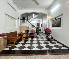 beautifully built residential house for sale in bac tu liem - farm lane near the street - front of the house before and after - hoa khoi red book.