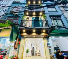 hoang cau dong da house for sale, 48 m, 4 floors, 4 bedrooms, car parking. upcoming planning to expand the side alley