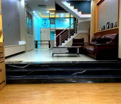 house for sale 100m from quang trung gv mt - car parked in front of the house - 65m2x4t - price 8.5 billion