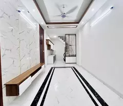 house for sale in dinh cong and hoang mai streets, car parked at door, alley very close to tran hao street.