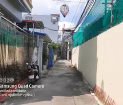 house for sale near phuong luu street - two cars parked in front of the gate, good price