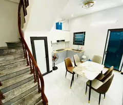 house for sale on hao nam street_two front and back views_sturdy construction, 33mx5t, price: 7.58 billion.