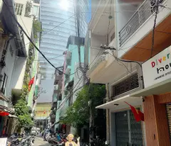 house for sale with 3 car faces on nguyen hue & ham nghi & hai trieu streets, district 1 - super product building view
