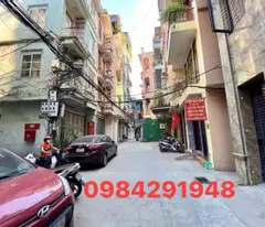 khuong dinh house for sale - car passes through house on alley, corner lot with 2 sides of lane 50m, built 5 floors