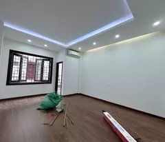 minh khai - hbt house for sale: thong tung lane - near cars - construction people