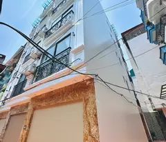 new house for sale built 6 floor elevator 68 cau giay lane, corner lot, modern design, near street, right now