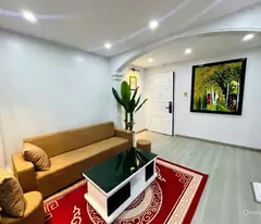 nghia tan collective house for sale 60m2 2 bedrooms price 4.55 billion with car parked at the door