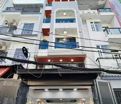 sale of house with 1 ground floor, 1 mezzanine, 4 floors - elevator, garage - phan huy ich - ward 14 go vap - hcm