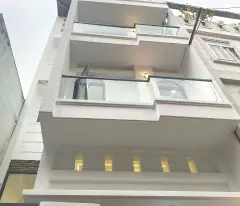 selling 4-storey house with car alley right on le quang dinh, area 42m2, price slightly 7 billion