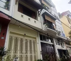 selling 5 floors adjacent to duong khue subdivision, price just over 16 billion, car access, sidewalk