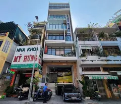 selling 7-storey office building (6 x 15) basement + full elevator, front of tran khac chan, district 1