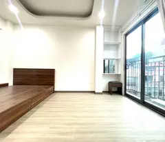 selling a 6-storey house with elevator on lac long quan street, tay ho, 1 car away from the house, 25m, 5.8 billion