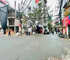 selling a sparkling 5-storey house on nguyen chinh's corner lot with cars parked for hoang mai business