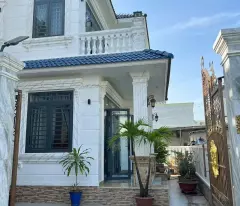 selling a villa with 1 ground floor and 1 floor, corner with 3 frontages, at kp7, tan phong ward. the land is 13m wide