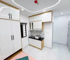 selling chdv van tri minh khai tu liem, car parked at gate, new construction, 48m2*7t*11p, fully furnished 50 million/month