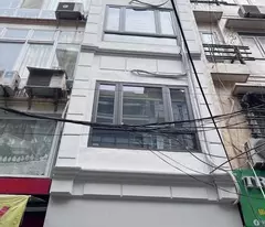 selling houses with subdivisions, sidewalks, cars, busy business - den lu 2, 30m2x4, 12.8 billion
