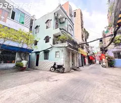 story house for sale front of truck alley, hai ba trung street, district 3 - area 64m2 - house 2 mt front and rear -