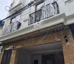 tan lap 6-storey house for sale. next to vinhomes dan phuong villa. elevator corner lot. car enters the house