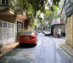 thai ha street building for sale 7 elevator floors - cash flow 150 million/month - in front of avoiding car house - division