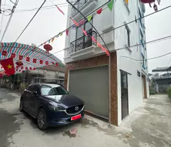 townhouse for sale in tan lap, dan phuong. next to west thang long avenue. corner lot for car business and entering the house